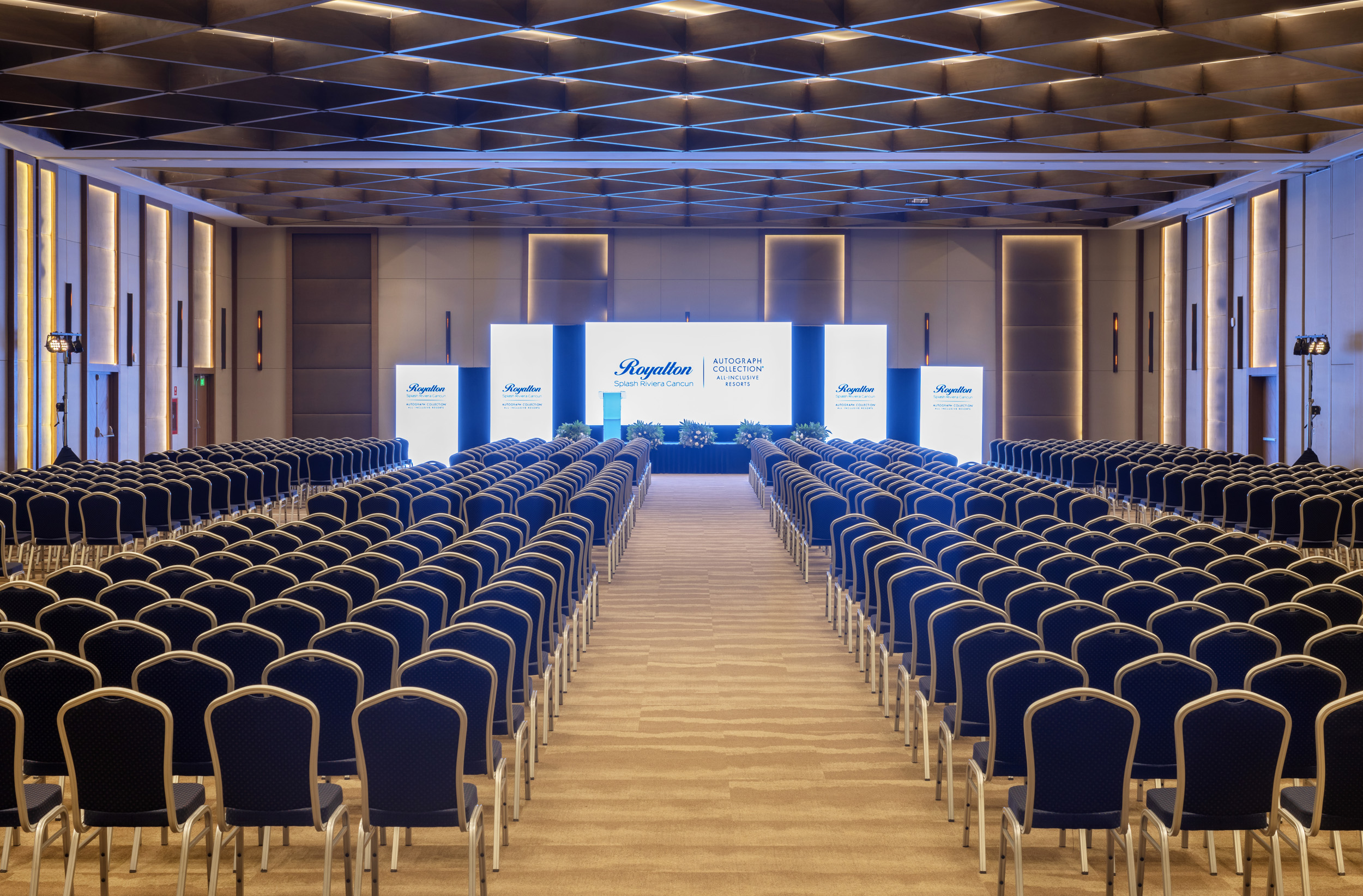 a room with rows of chairs