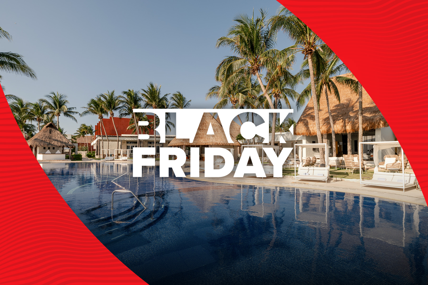 a pool with palm trees and a building