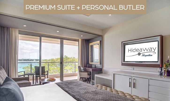 a room with a bed and a television