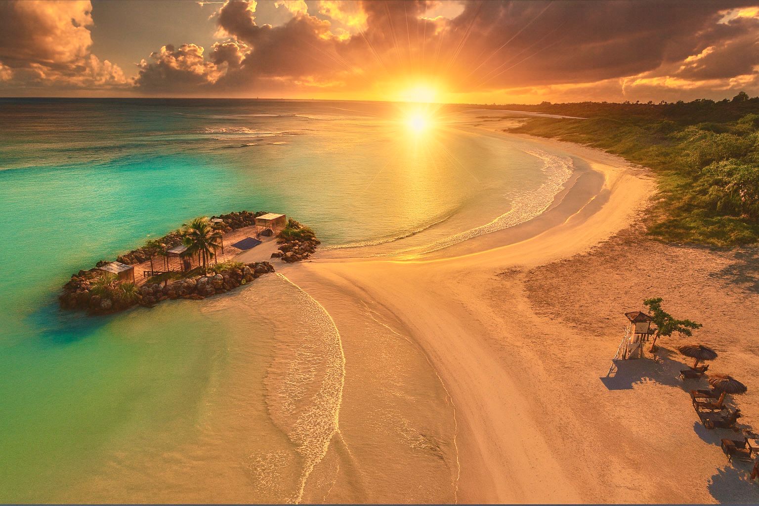 a beach with a body of water and a hut
