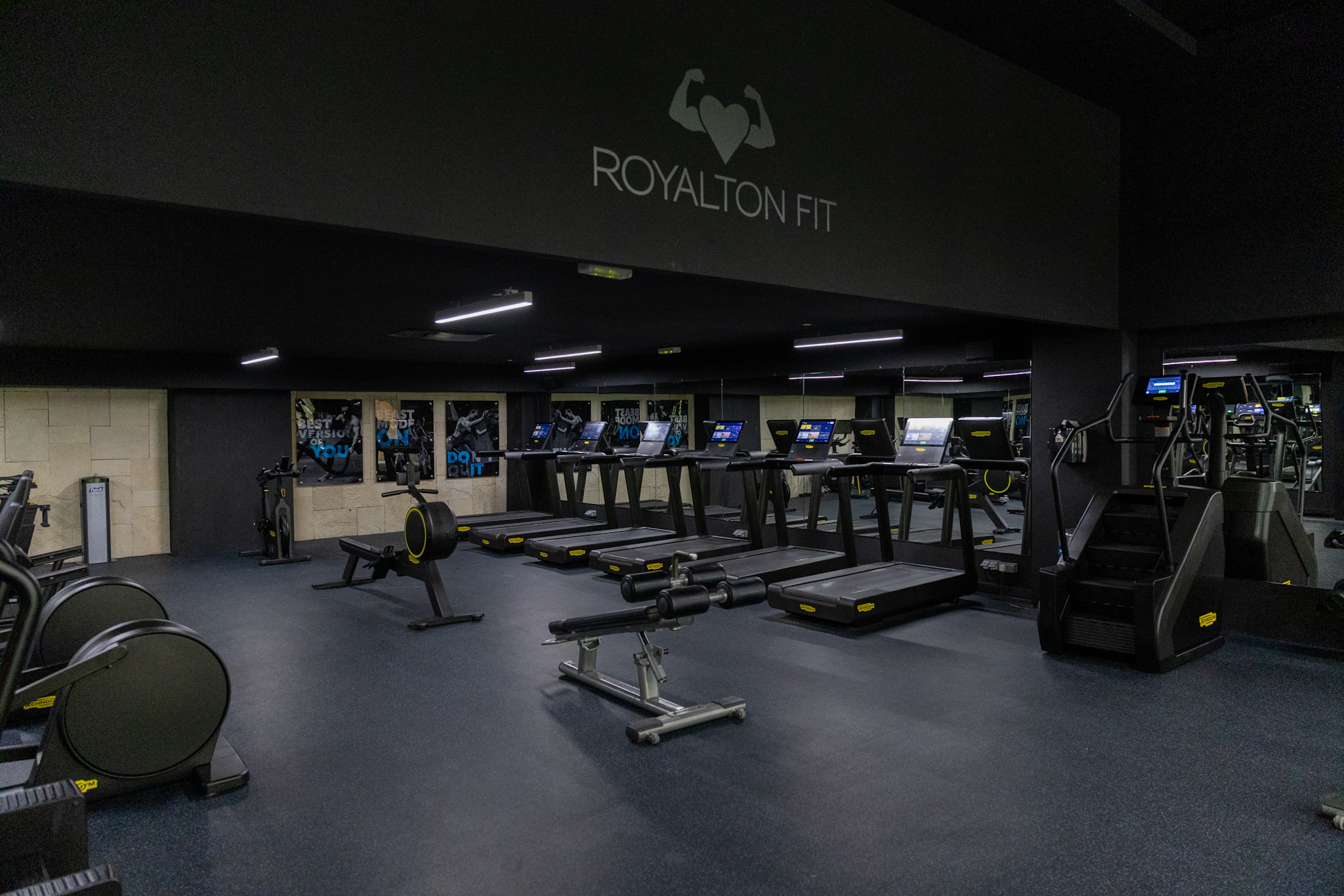 a gym with treadmills and exercise machines