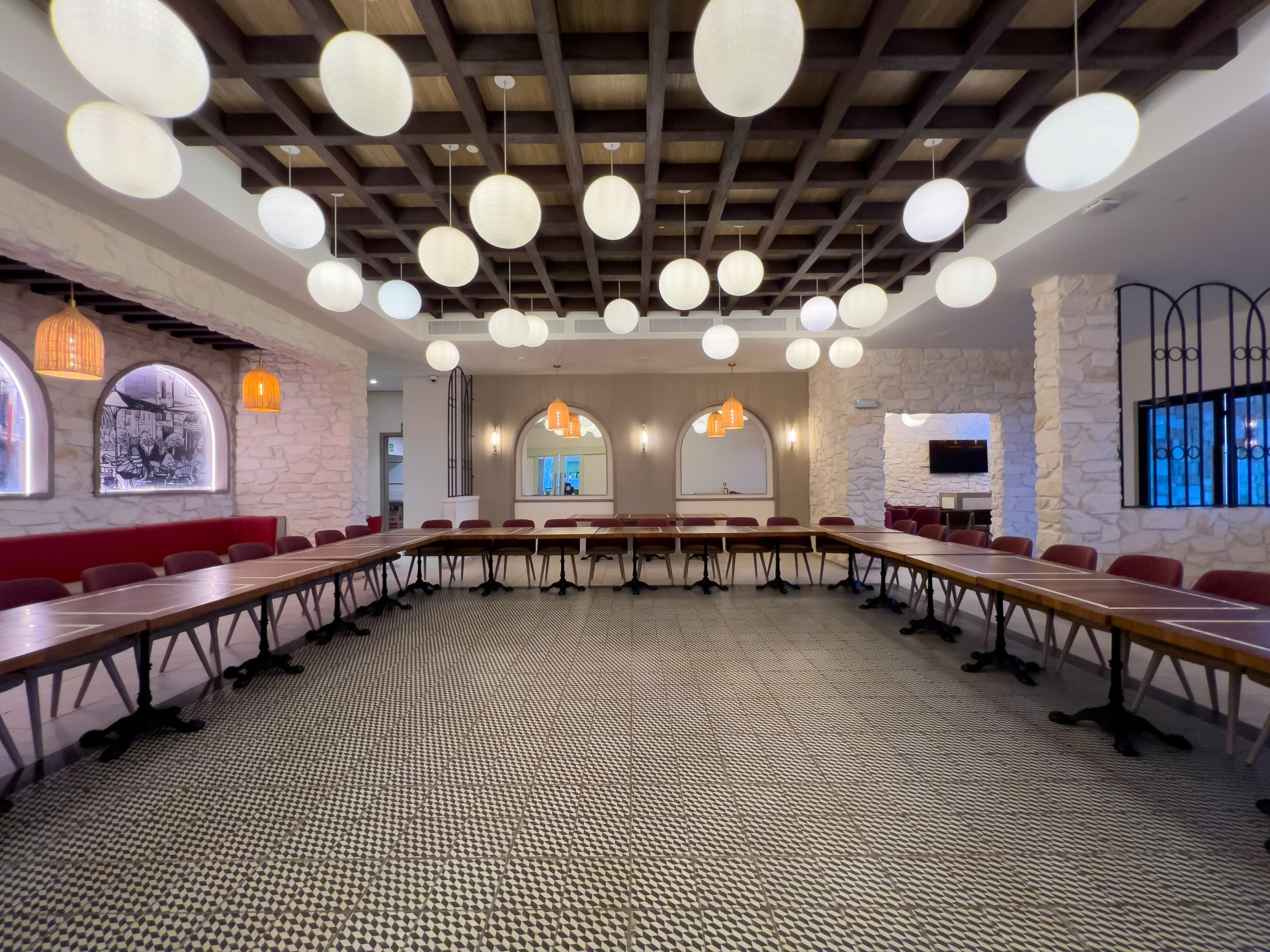 a room with tables and chairs