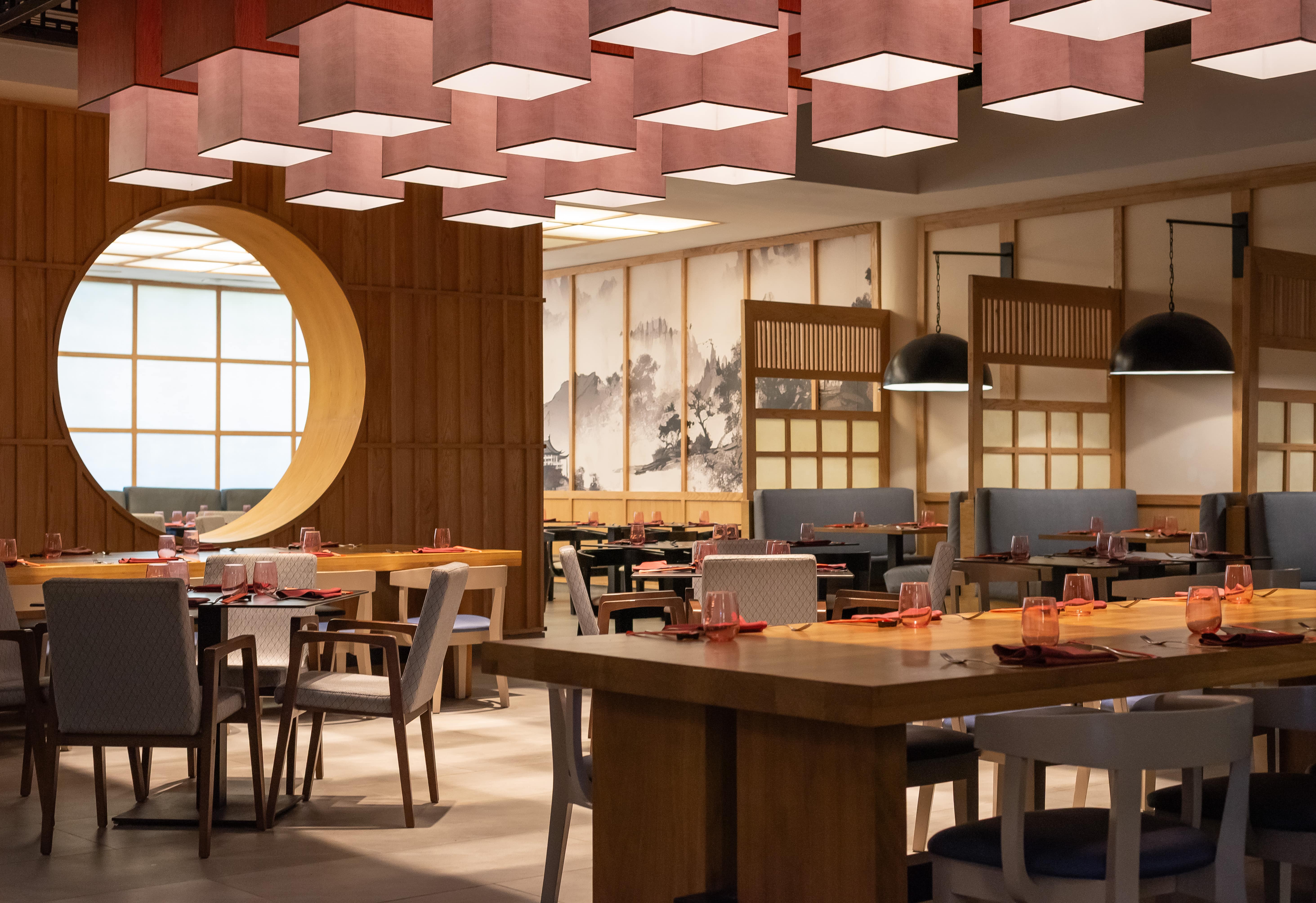 a restaurant with tables and chairs