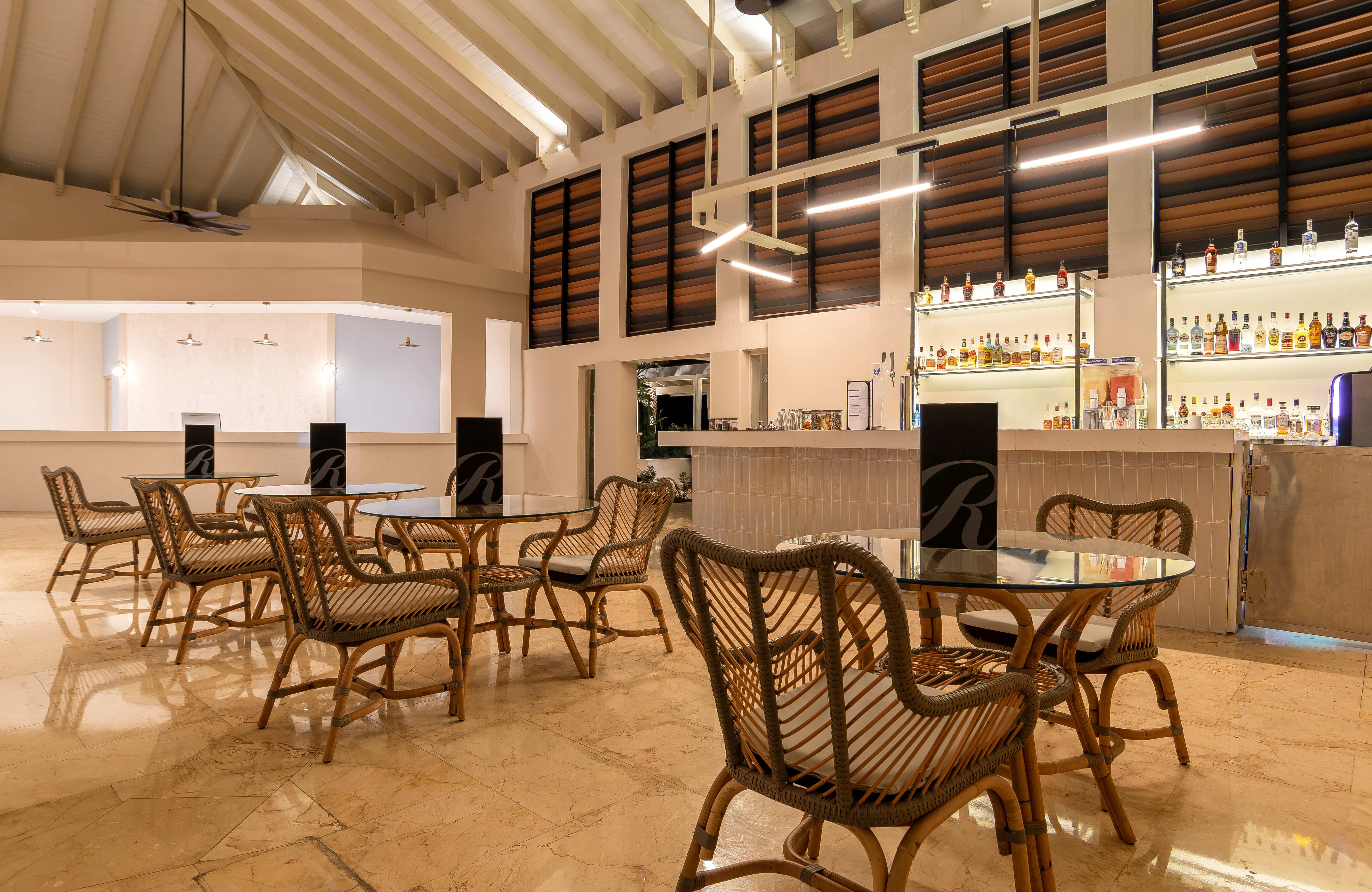 a room with tables and chairs