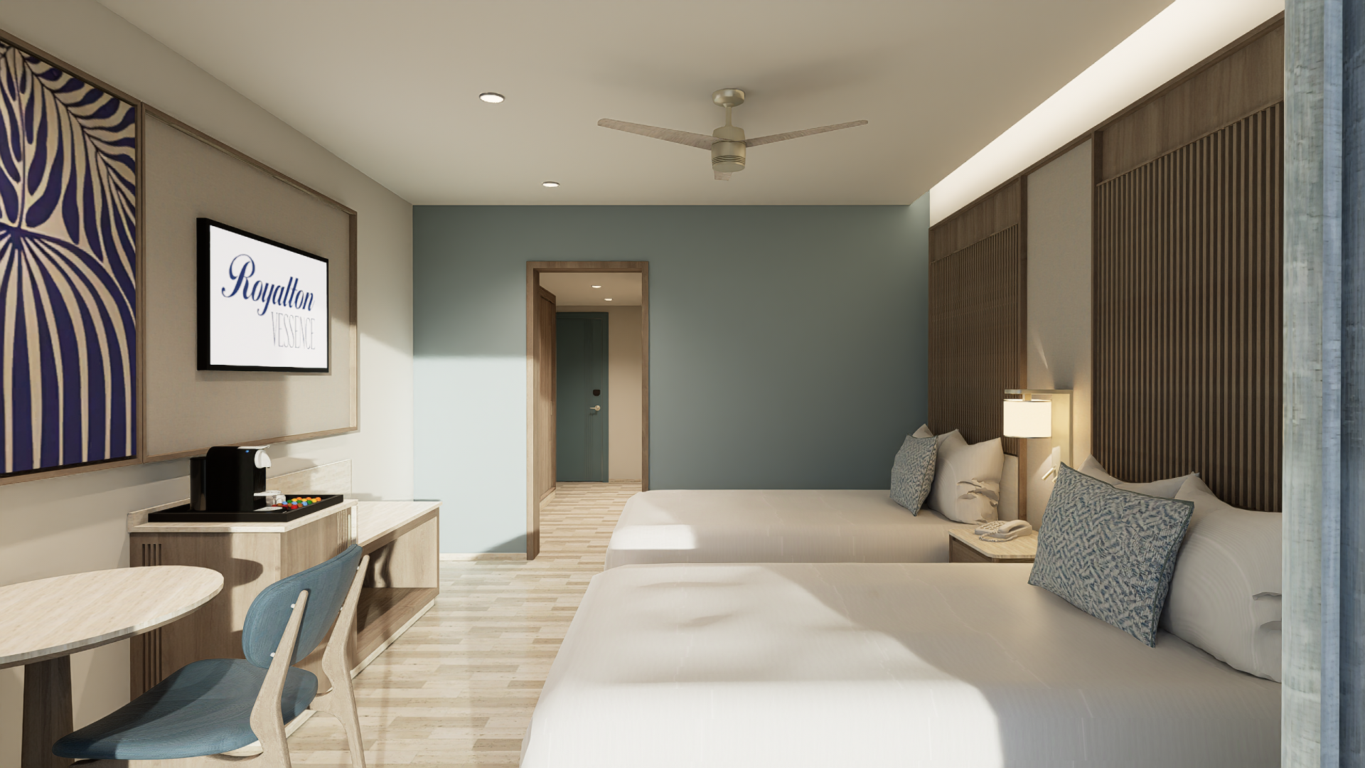 a room with two beds and a desk