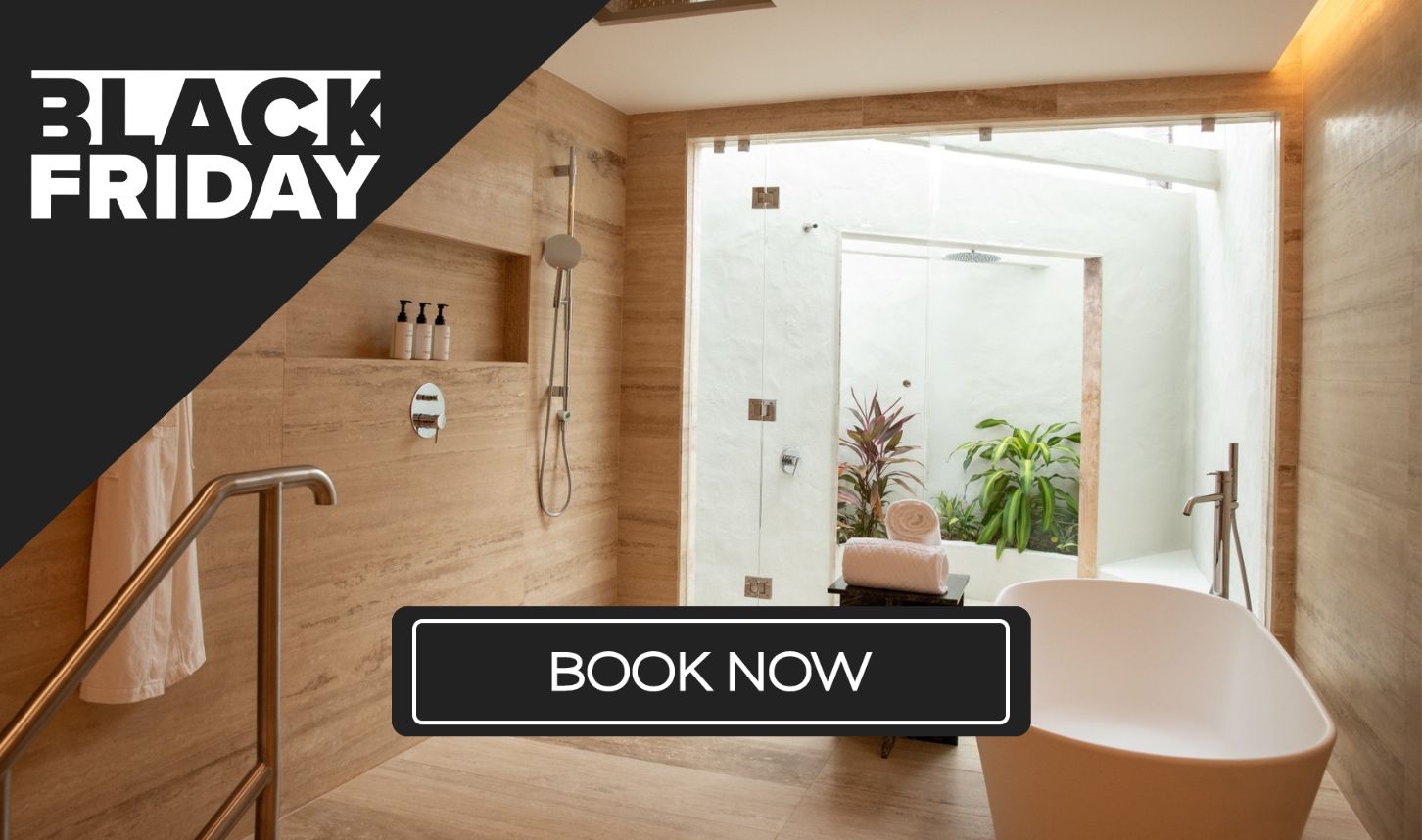 a bathroom with a tub and shower