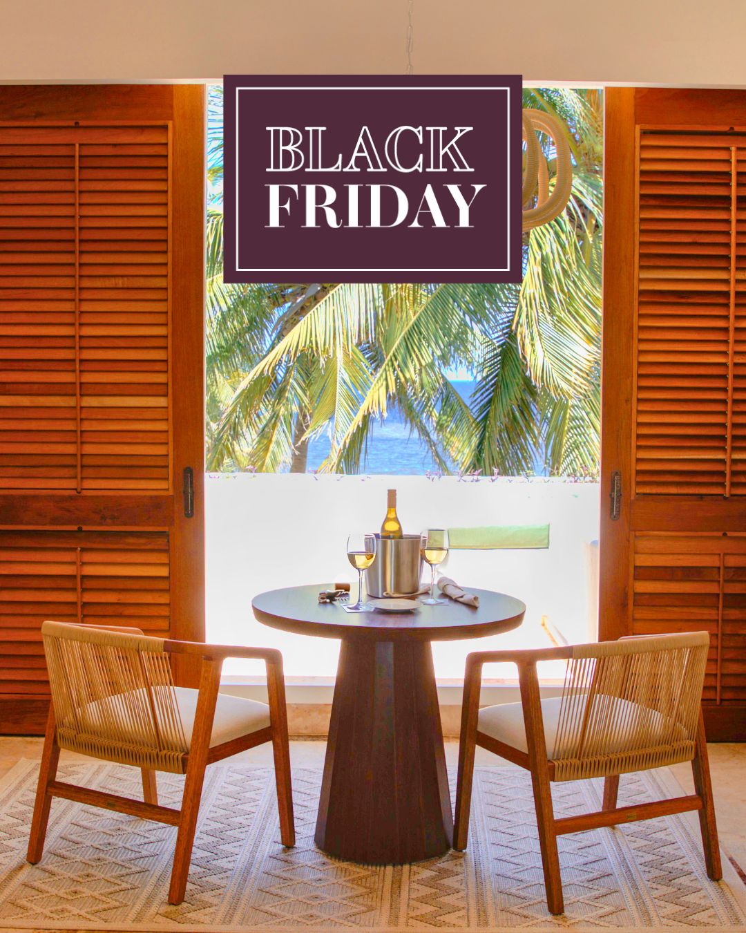 a table with wine glasses and a bottle of wine on it