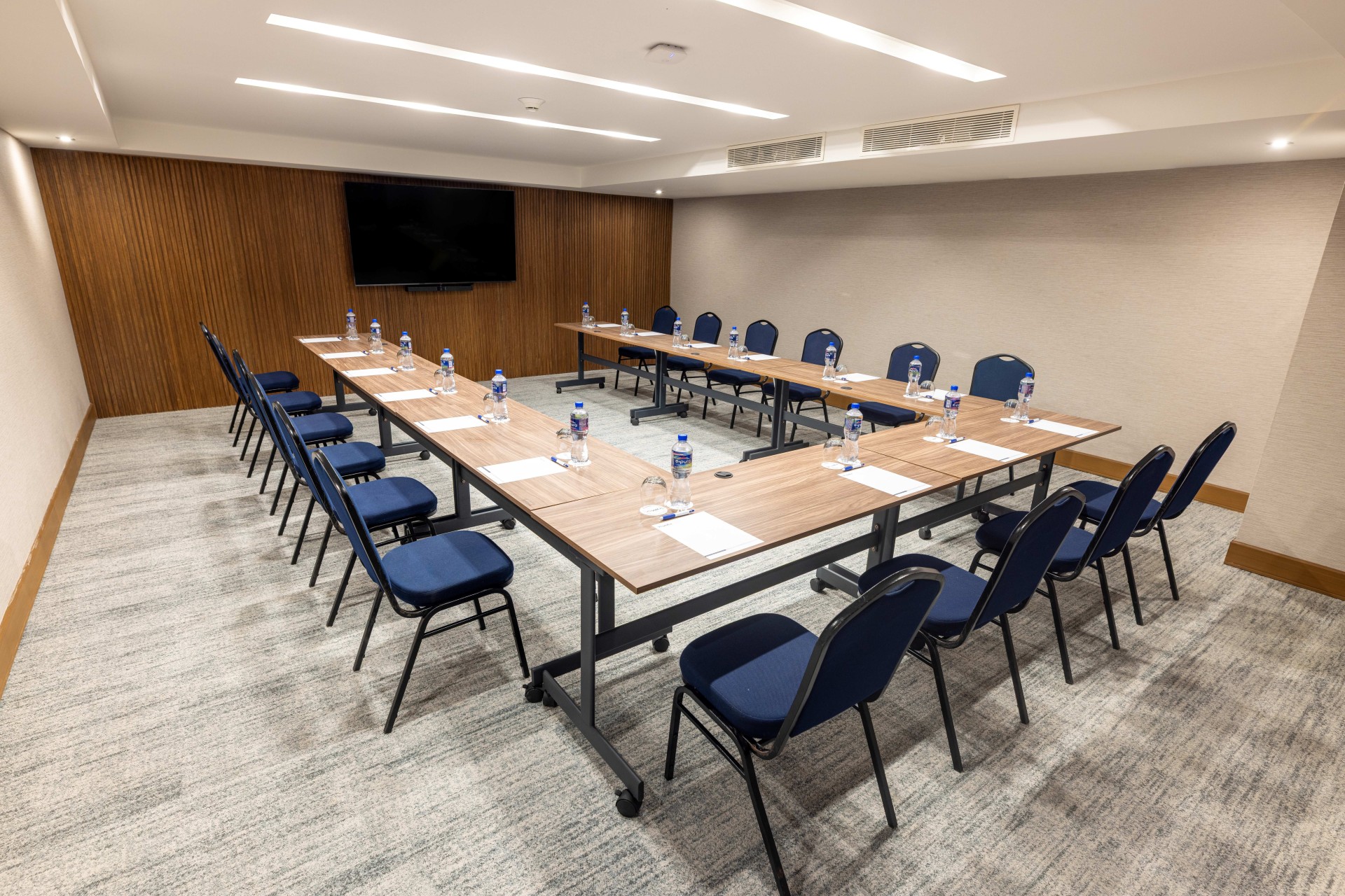 a conference room with chairs and tables