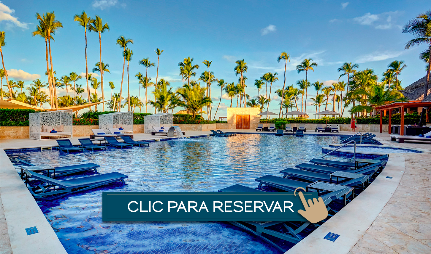 a pool with lounge chairs and palm trees