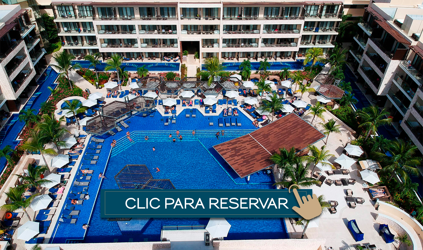 a swimming pool with umbrellas and palm trees