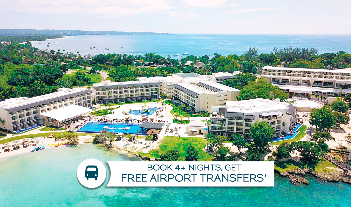 a group of buildings next to a body of water