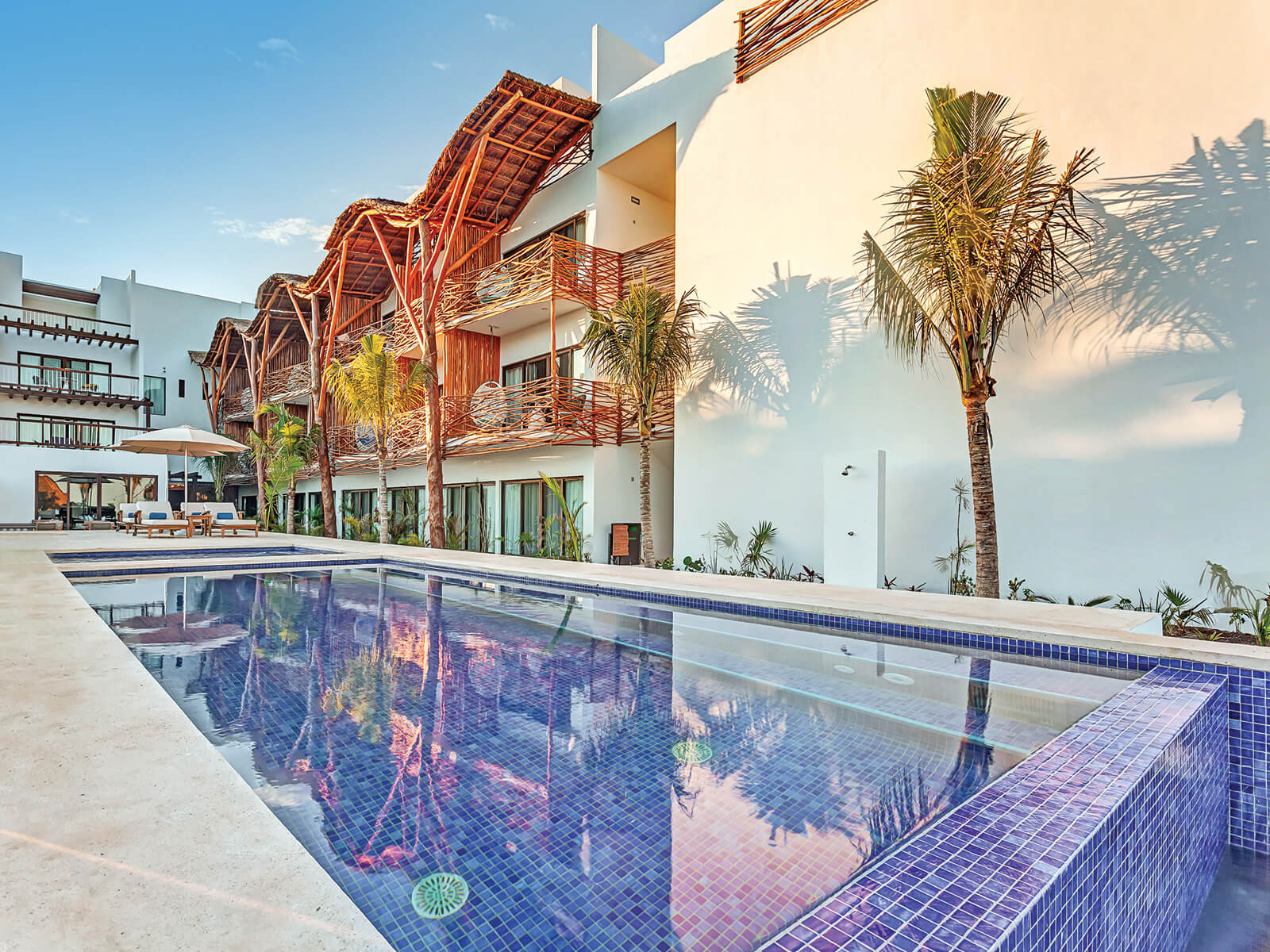 a pool in front of a building