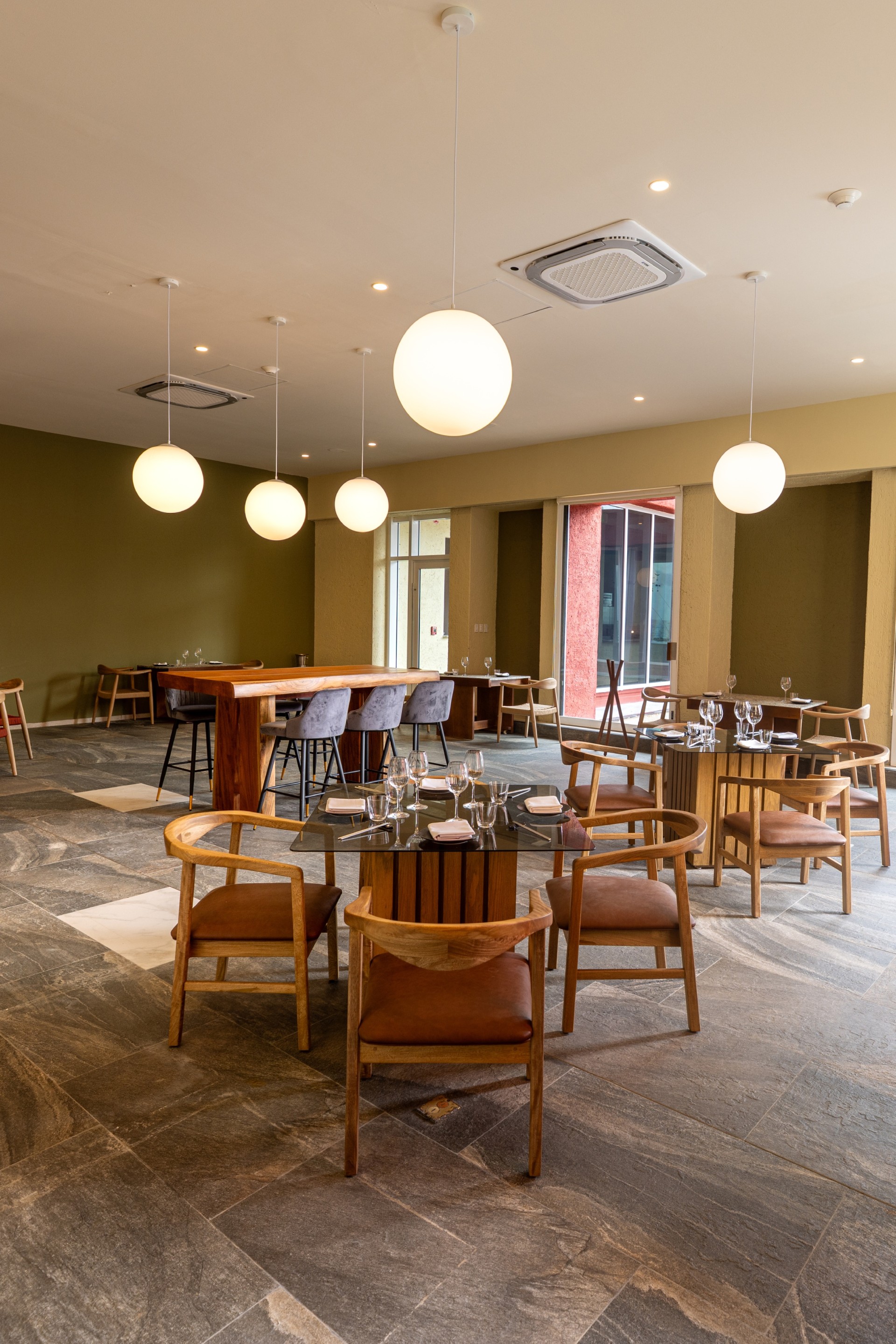 a room with tables and chairs