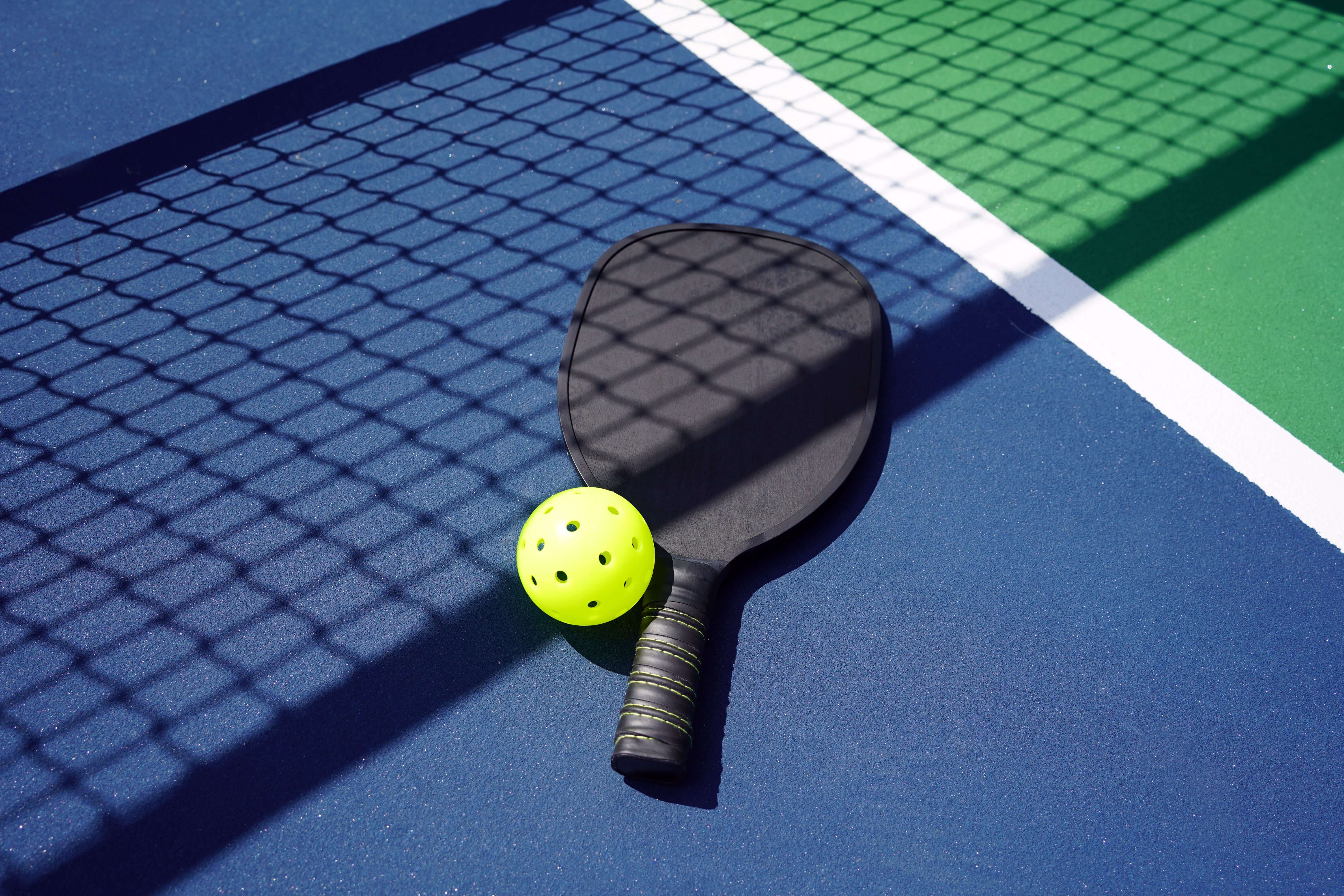 a tennis racket on a tennis court