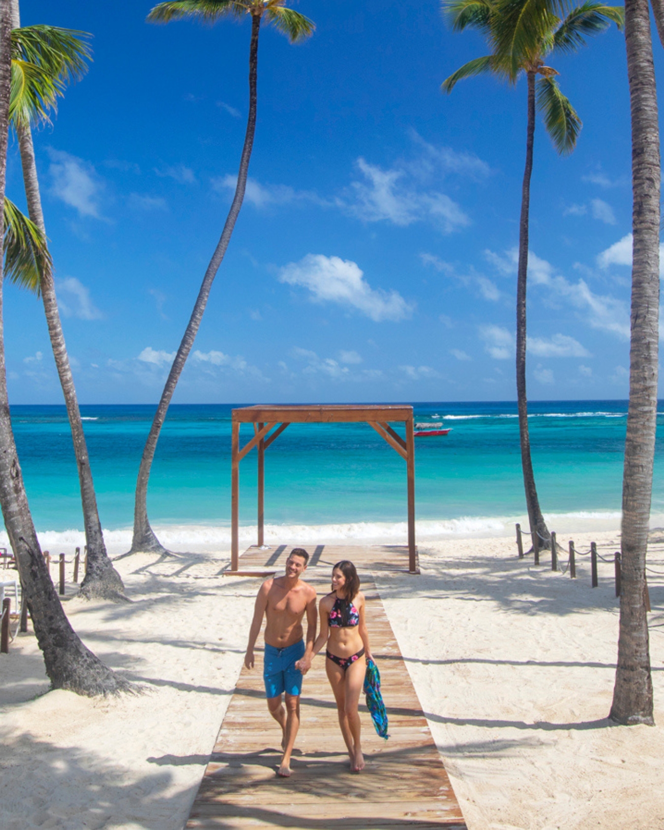 a man and woman on a beach