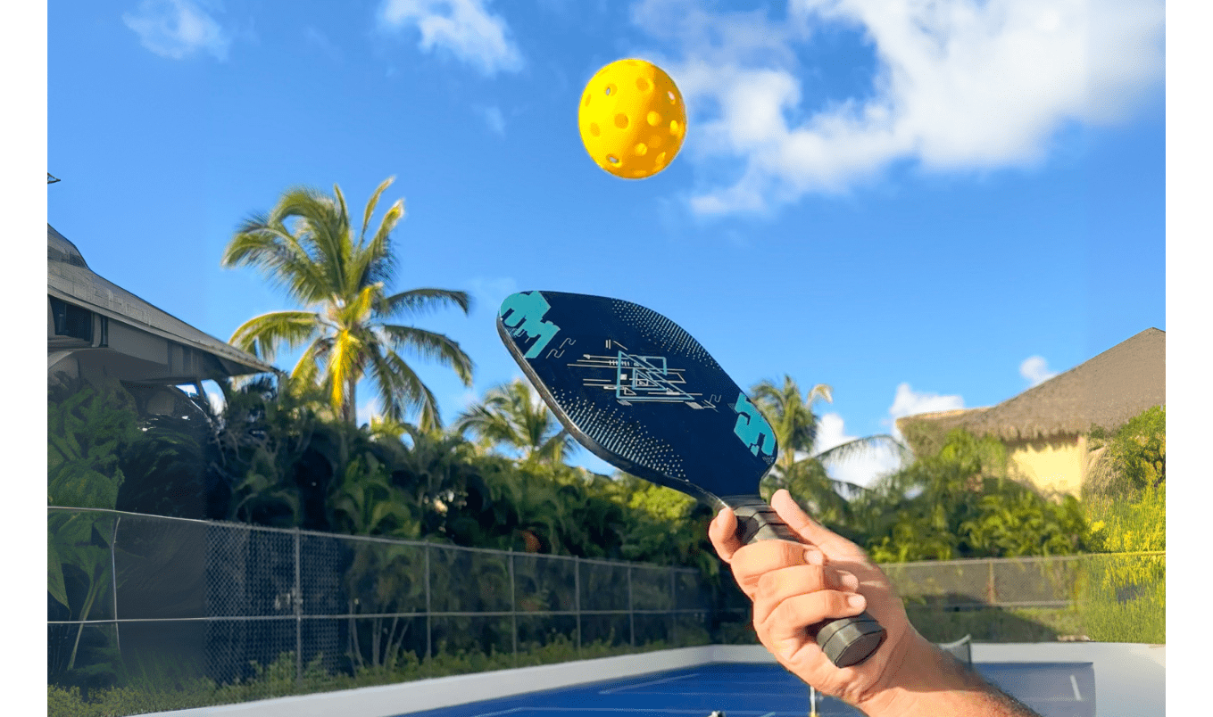 a paddle hitting a ball