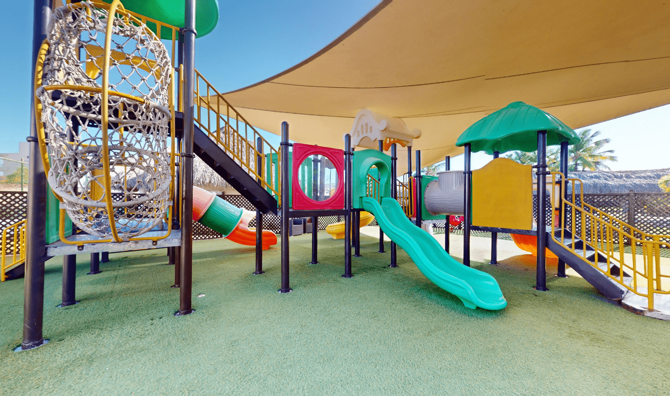 a playground with a shade