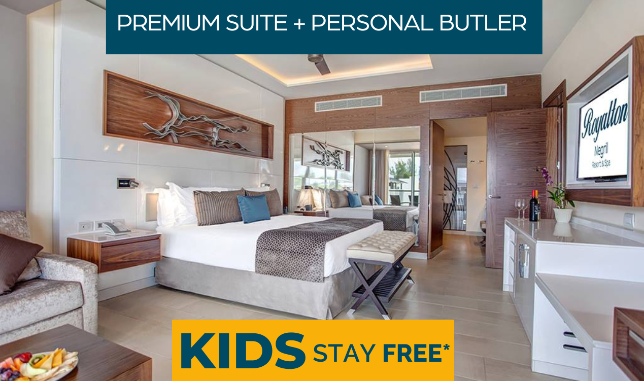 a hotel room with a bed and a bench