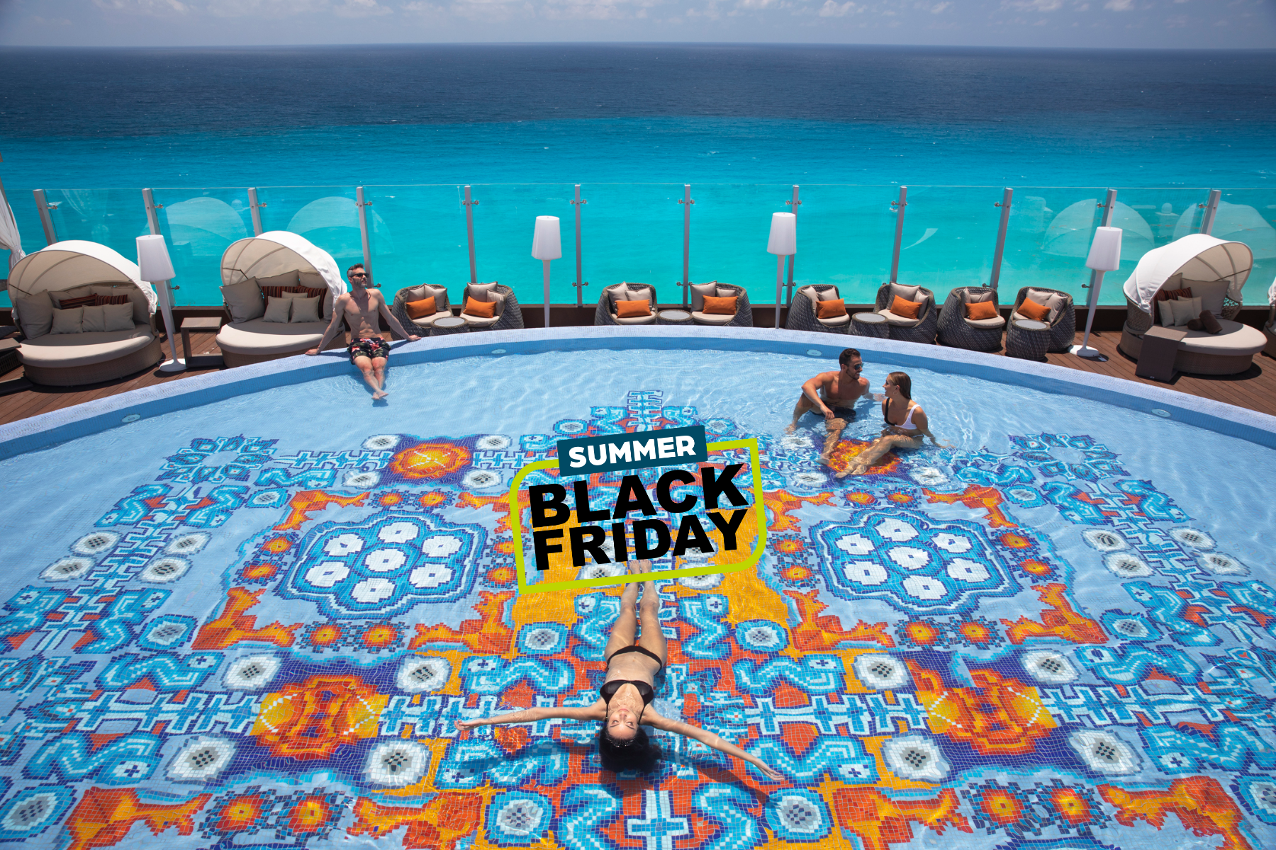 a group of people in a pool with a sign on the side