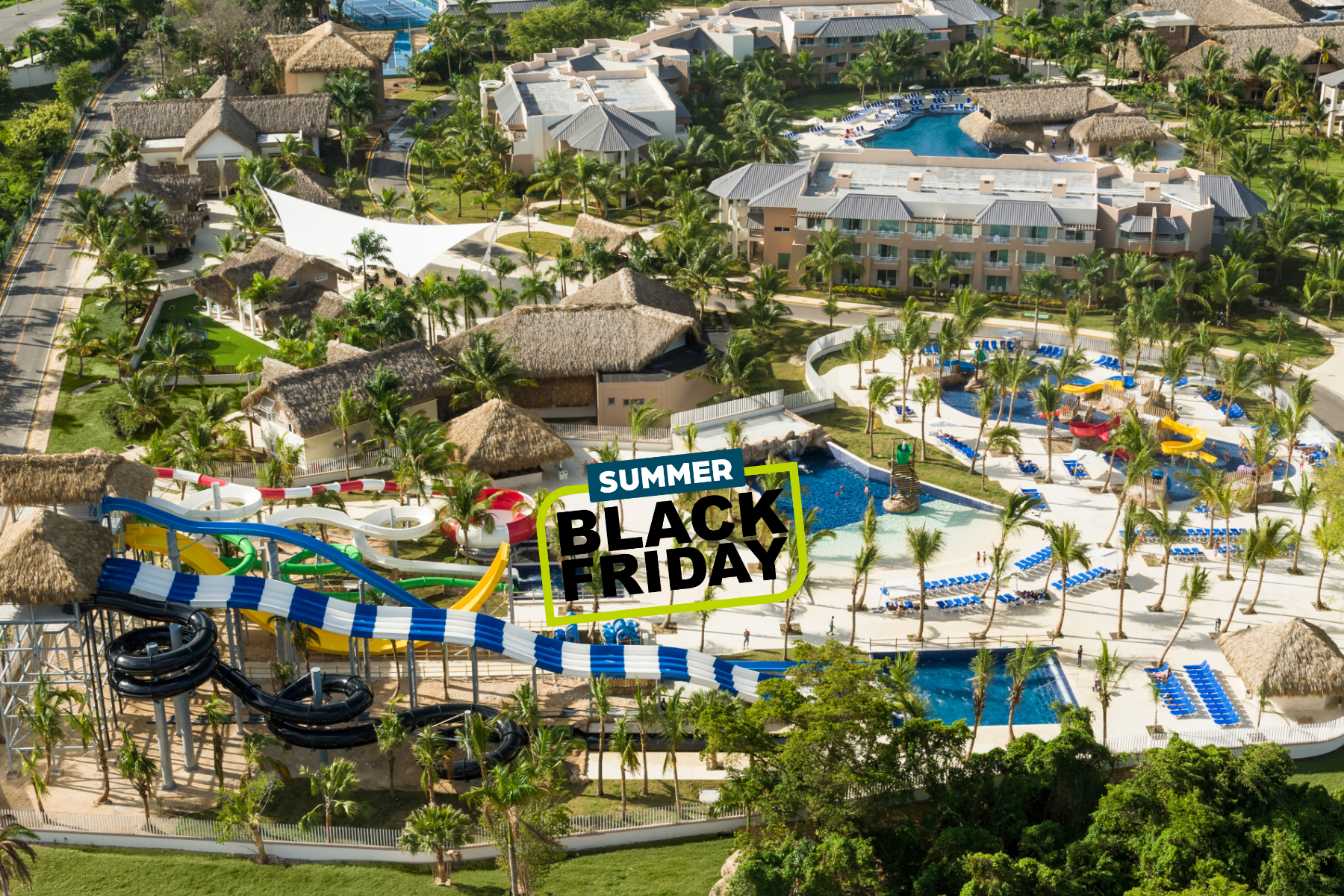 a water park with a slide and a pool