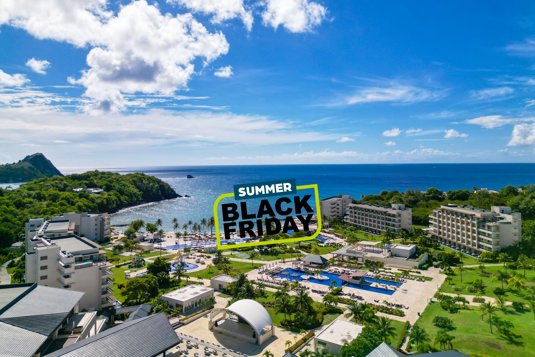 a group of buildings next to a body of water