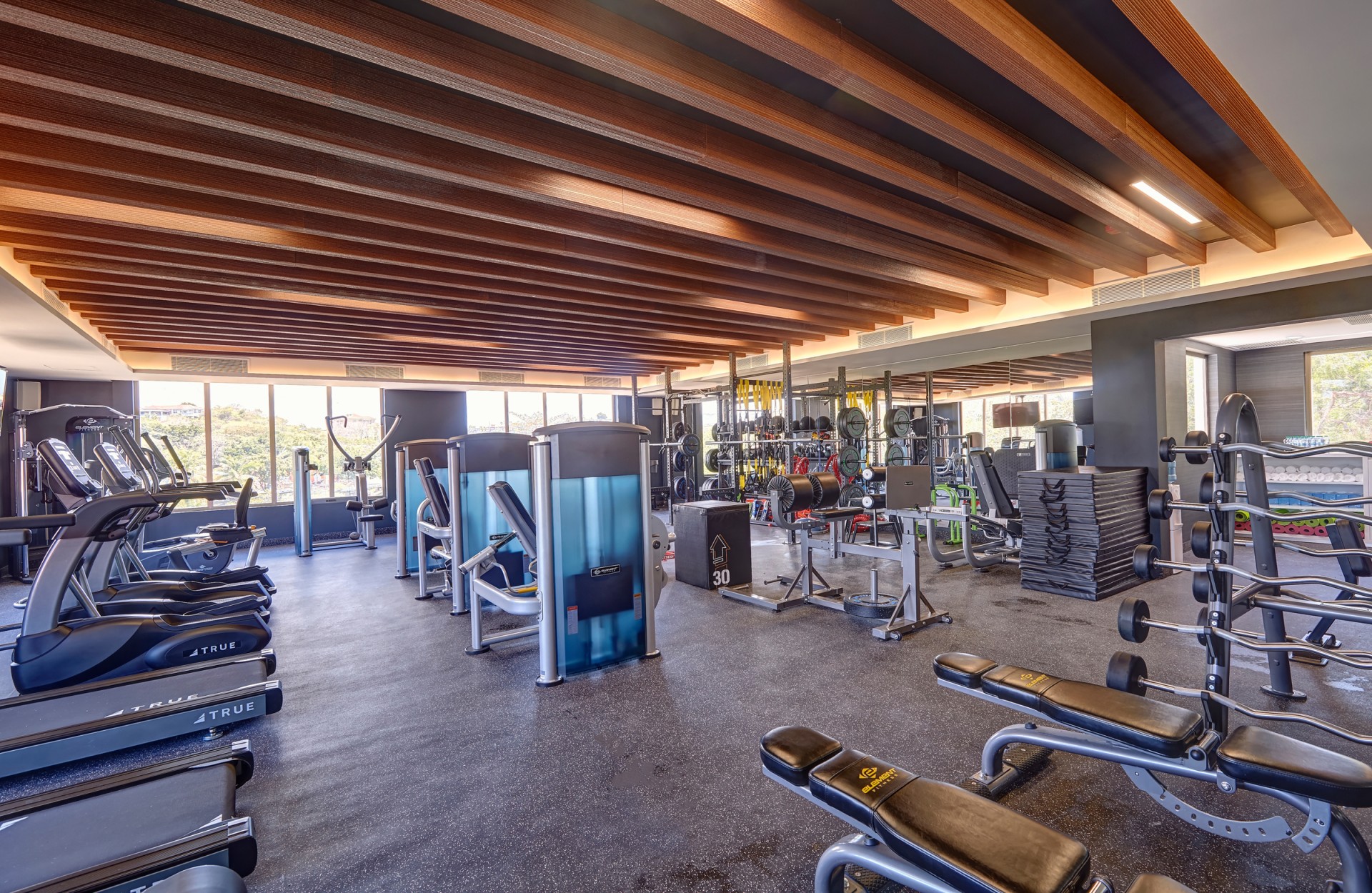 a large gym with exercise equipment