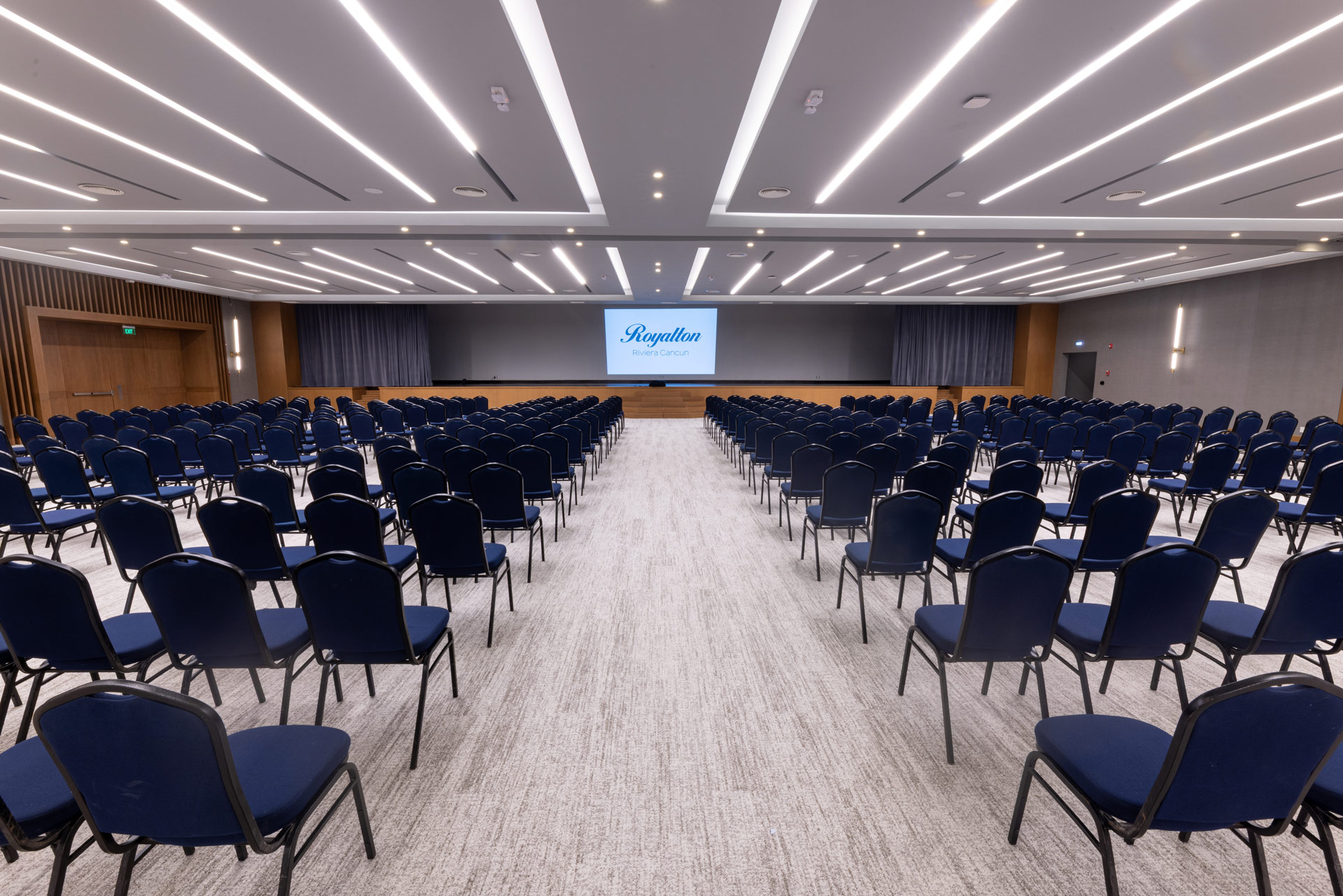 a room with rows of chairs