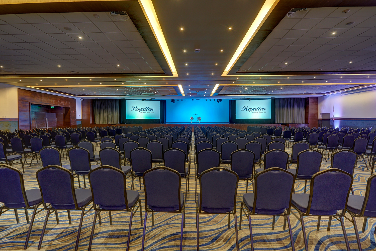 a large room with rows of chairs