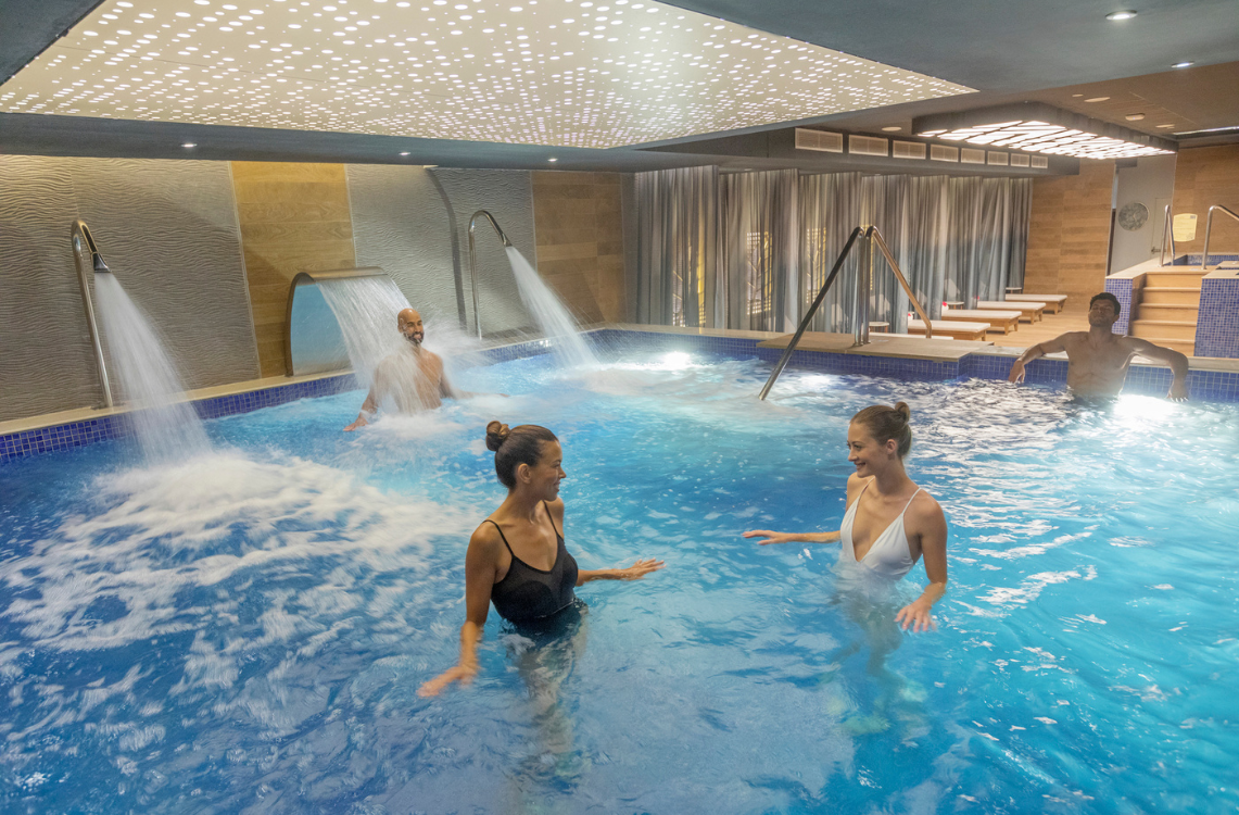 a group of people in a pool