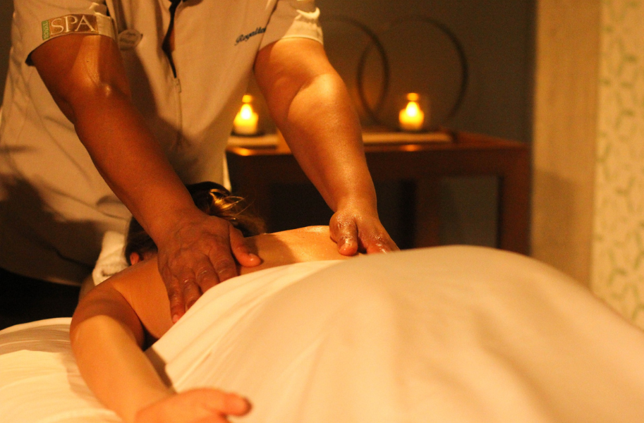 a person receiving a back massage