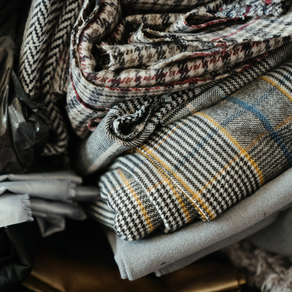 a pile of blankets and blankets