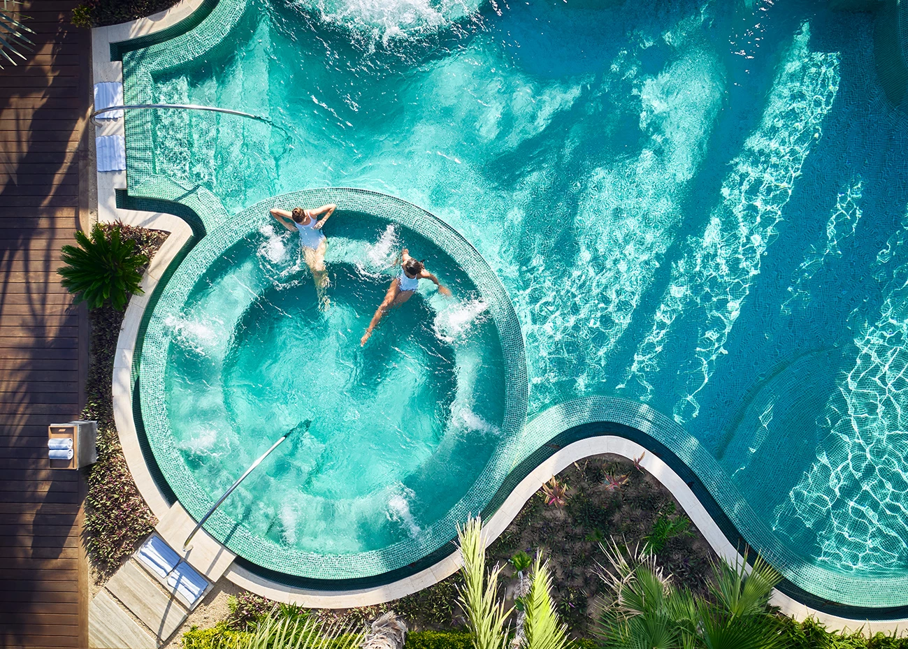 a group of people in a pool