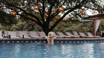 a woman in a pool