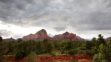 a red rock mountains and trees