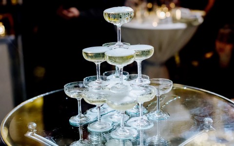 a pyramid of champagne glasses