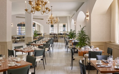 a room with tables and chairs