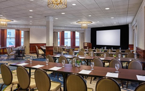 a room with tables and chairs