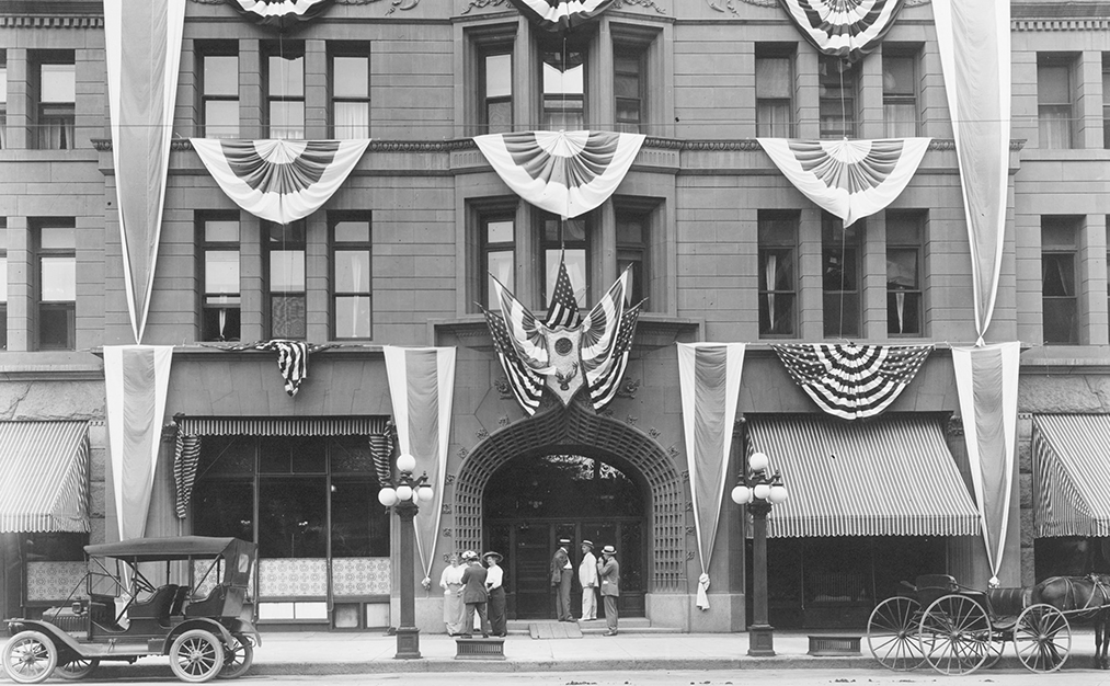 a group of people standing outside of a building