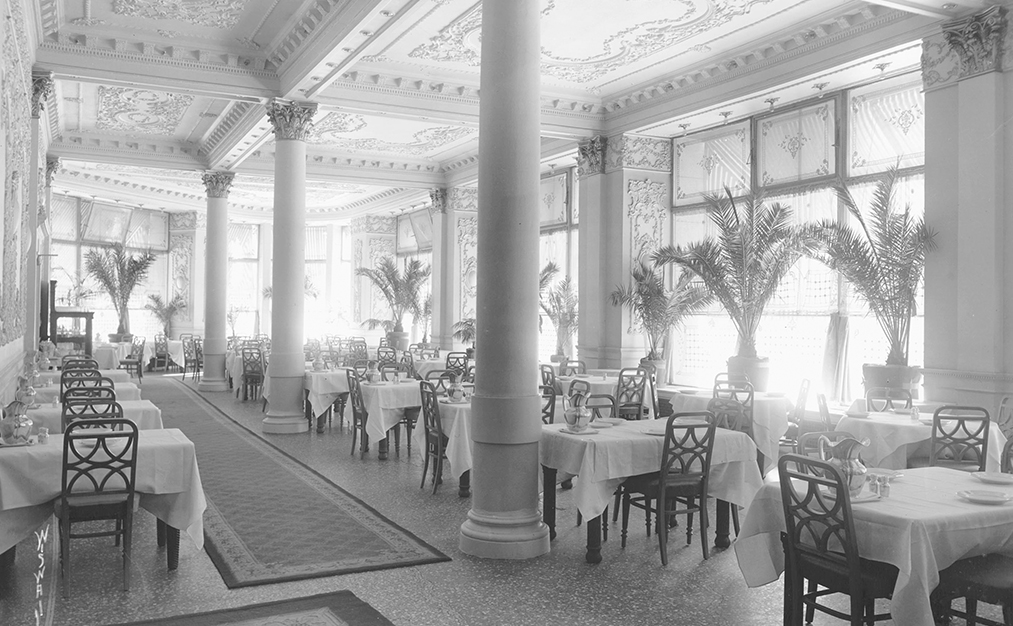 a room with tables and chairs