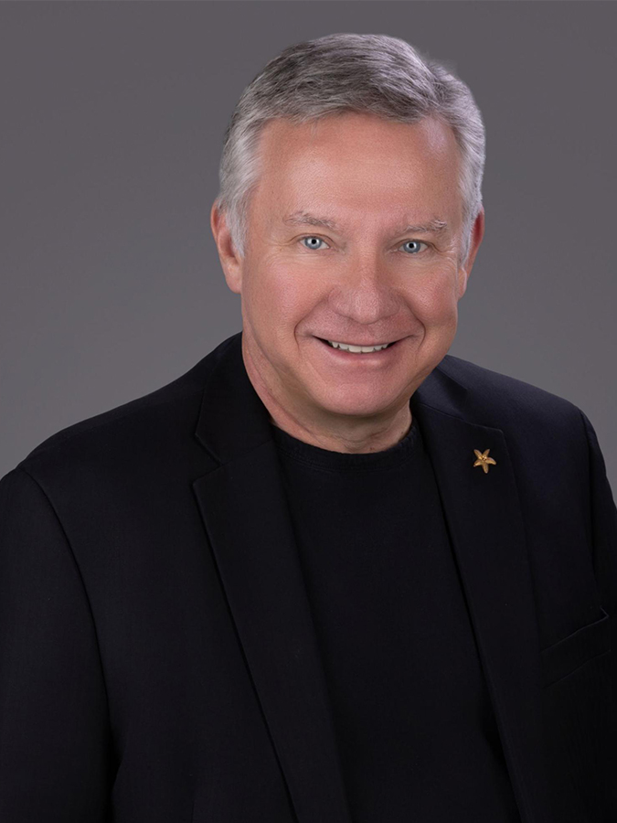 a man in a black suit