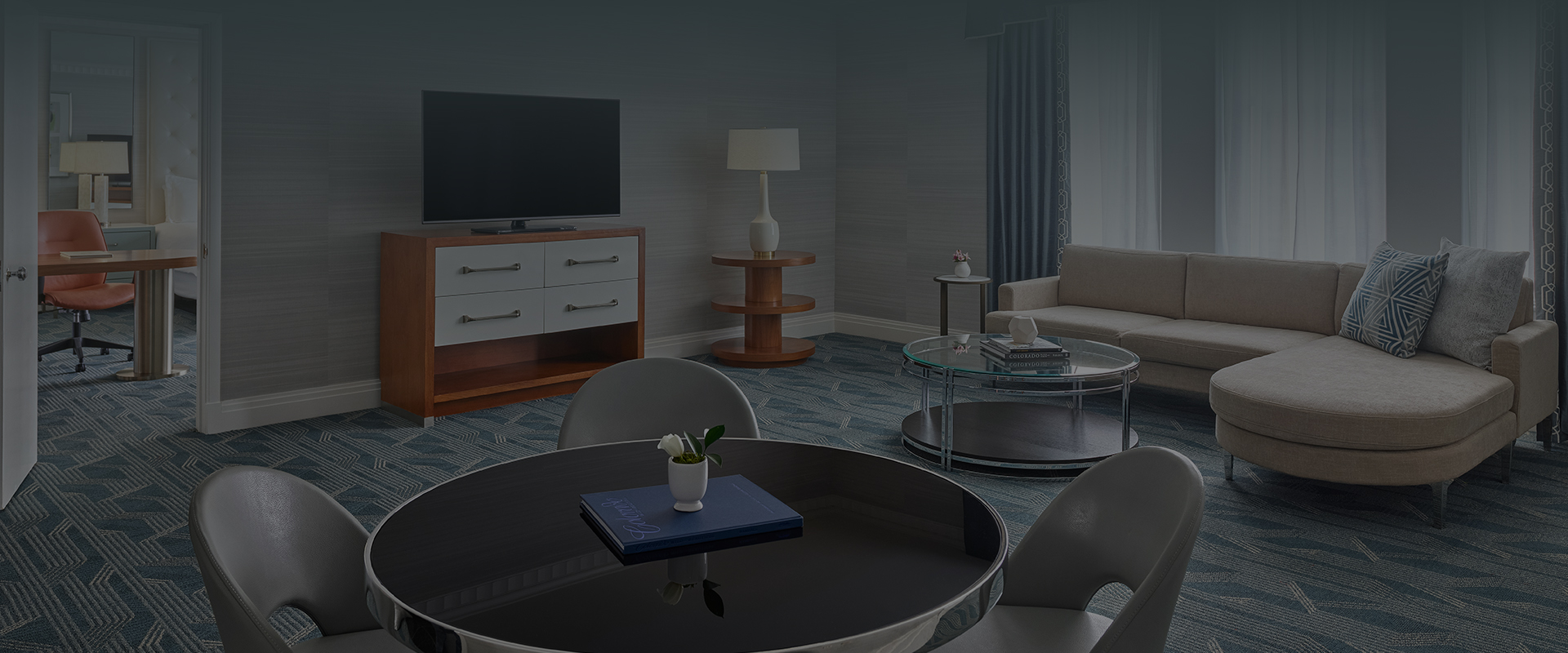 a room with a television and a table