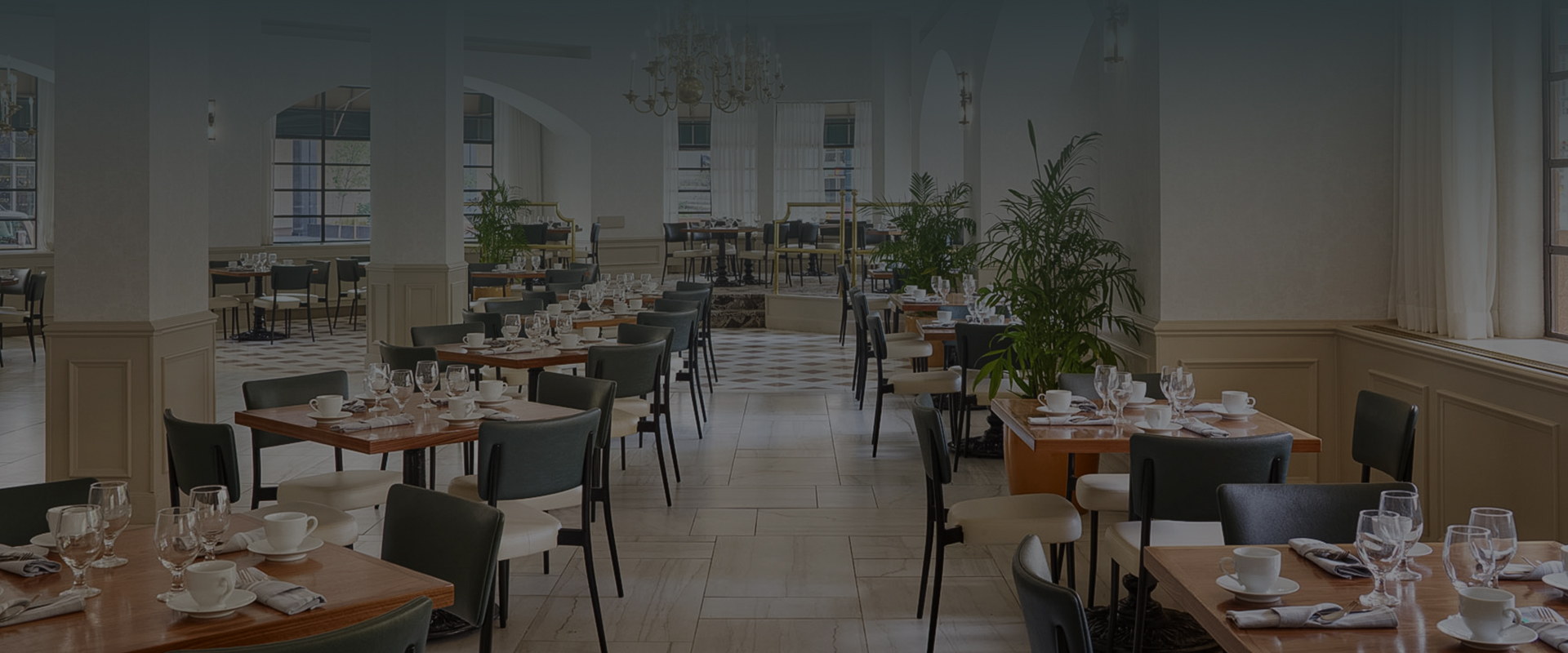 a room with tables and chairs