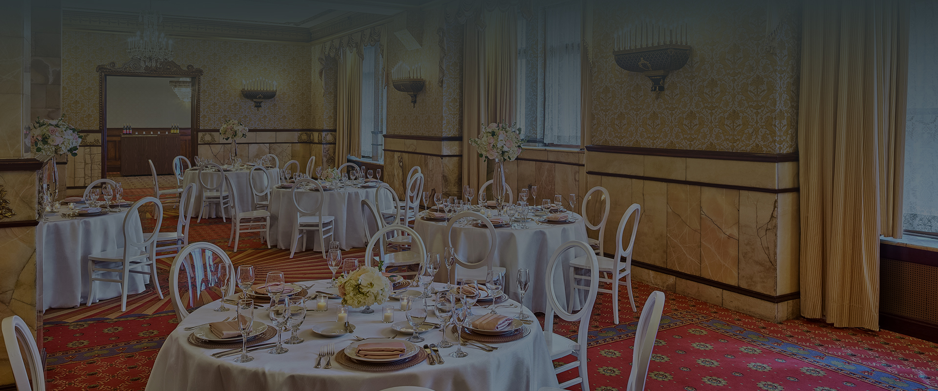 a room with tables and chairs