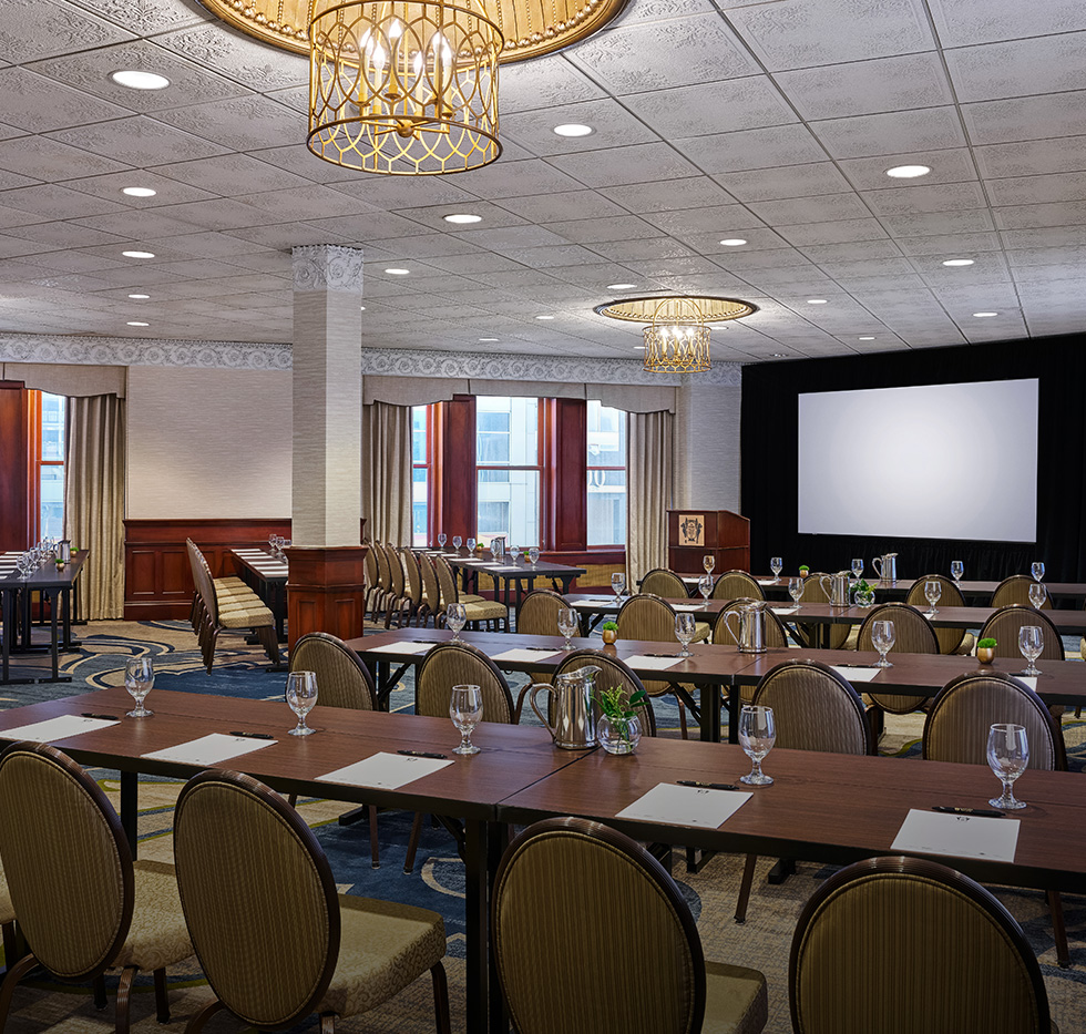 a room with tables and chairs