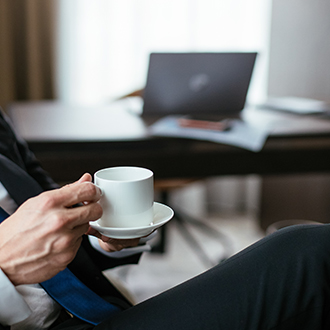 a person holding a cup