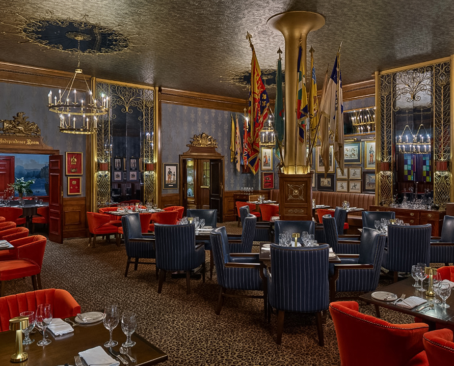 a room with tables and chairs