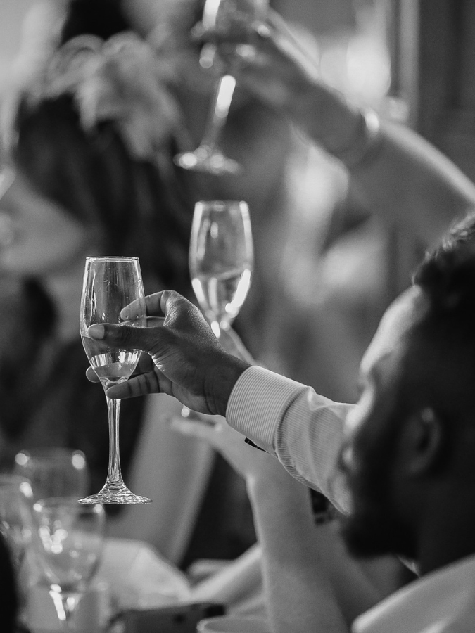 a man holding a wine glass