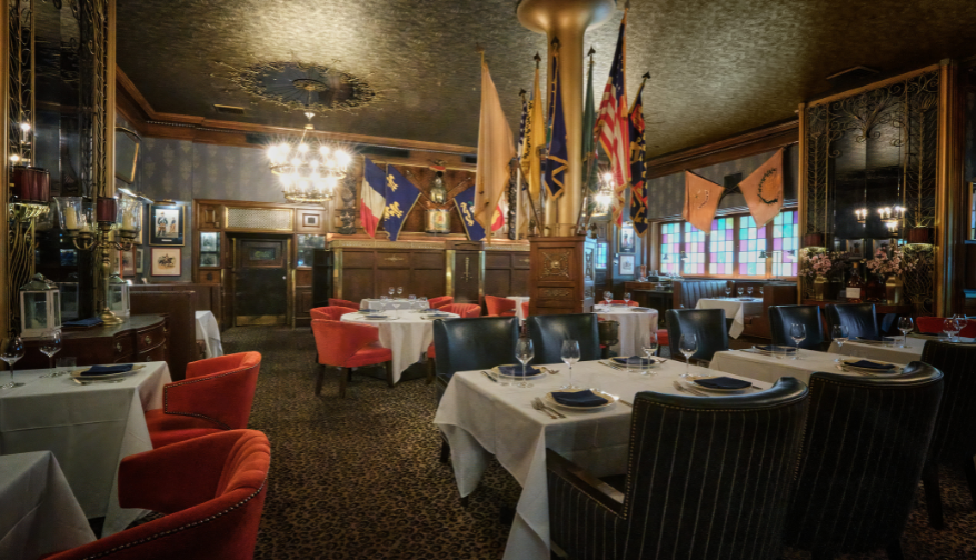 a restaurant with tables and chairs