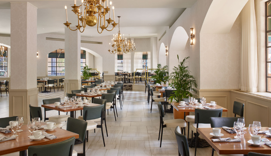 a room with tables and chairs