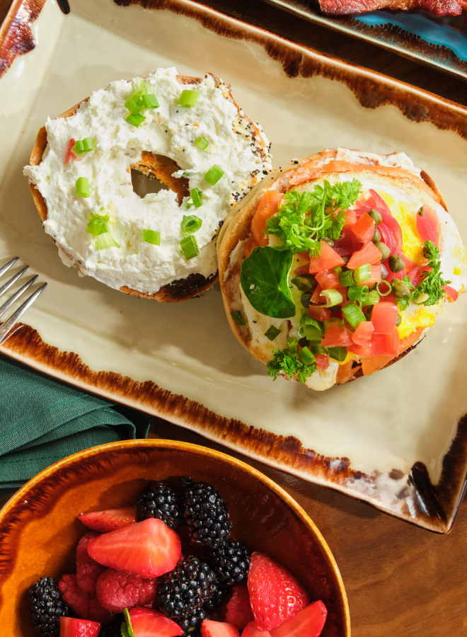 a plate of bagel with a bagel topping